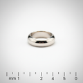 Platinum slip-ring marker band on white gradient background with millimeter scale bar